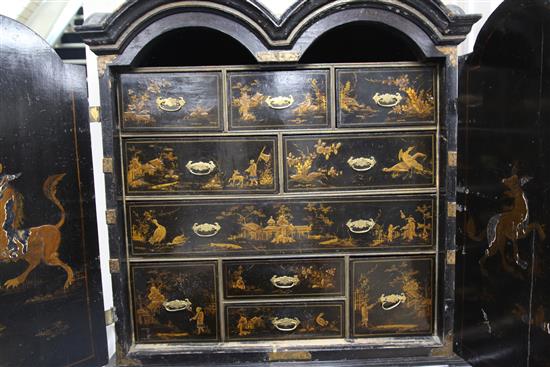 A William & Mary chinoiserie black japanned double dome top secretaire cabinet, W.3ft 6in. D.1ft 9in. H.6ft 5in.